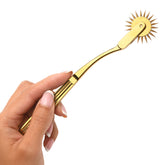 Close up of Master Series Wartenberg Sensory Pinwheel - Gold