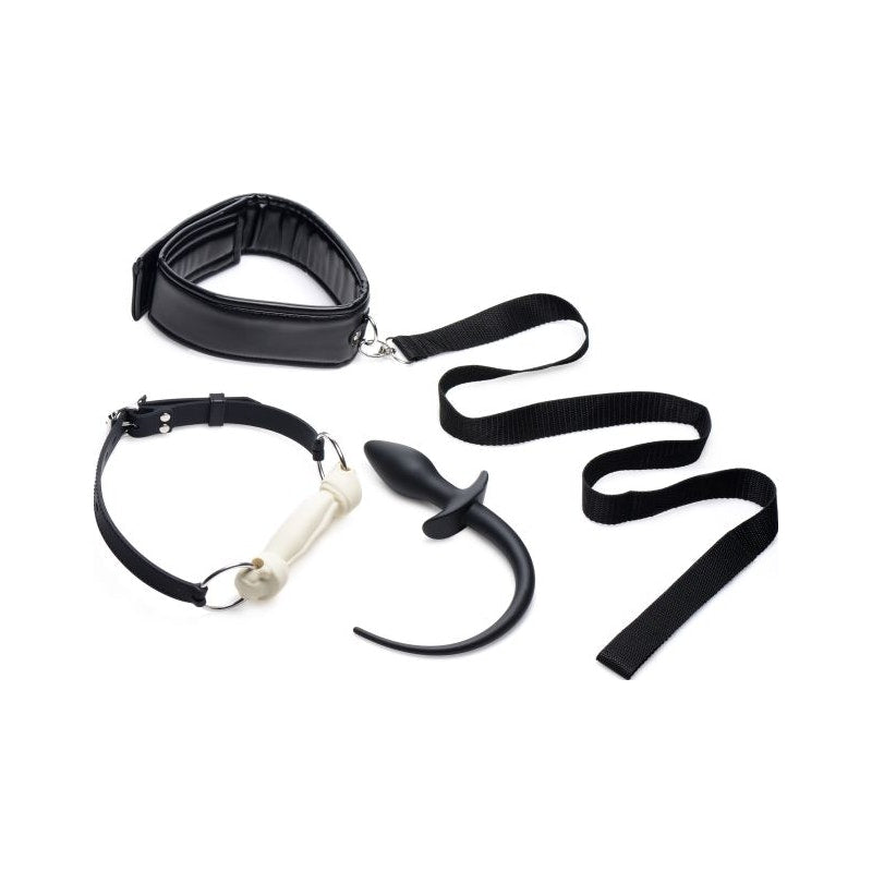 A set of black puppy play accessories including a silicone bone-shaped gag, a flexible silicone tail butt plug, a cushioned adjustable collar, and a leash.