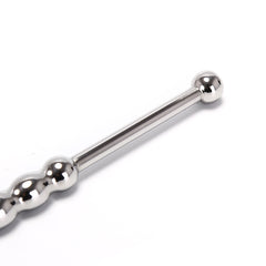 Stainless steel urethral sounds. Curved ends.