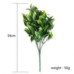 Green medium sized artificial plant 7 forks of foliage with approx. 35 leaves.