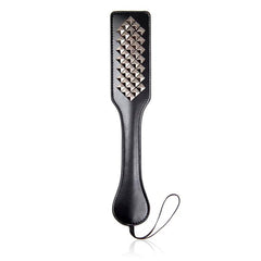 Studded leather bound paddle