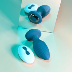 Playboy Pleasure SPINNING TAIL TEASER Vibrating Anal Plug - Teal Blue