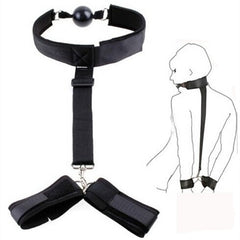 Restraint set - mouth gag with connected wrist cuffs