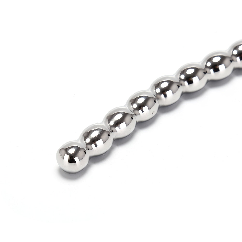 Stainless steel urethral sounds. Curved ends.