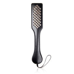 Studded leather bound paddle