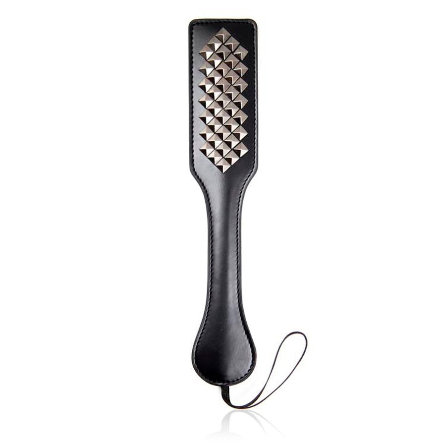 Studded leather bound paddle