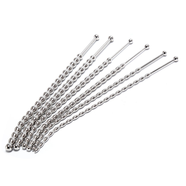 Stainless steel urethral sounds. Curved ends.