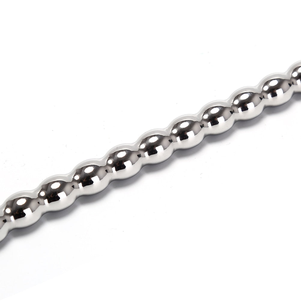 Stainless steel urethral sounds. Curved ends.