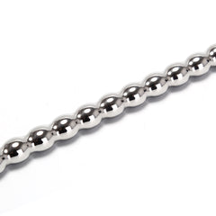 Stainless steel urethral sounds. Curved ends.